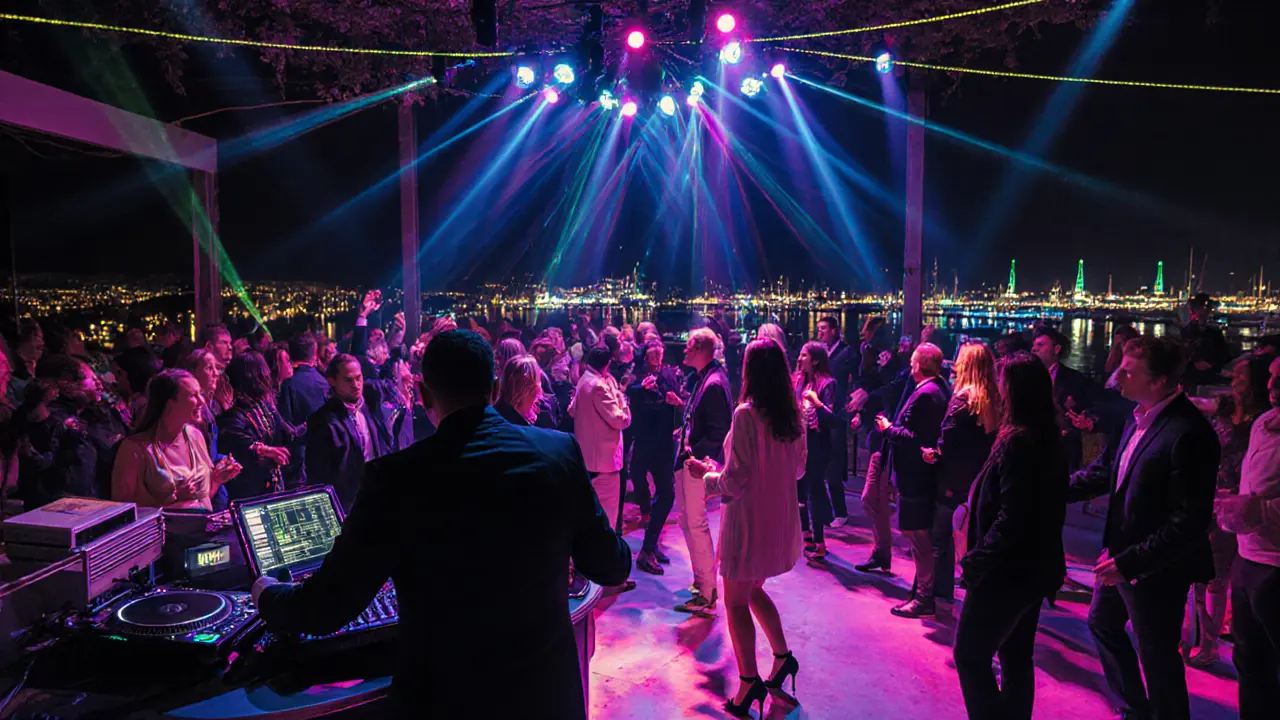 Jimmy'z Club terrace with DJ, laser lights and upscale crowd dancing.
