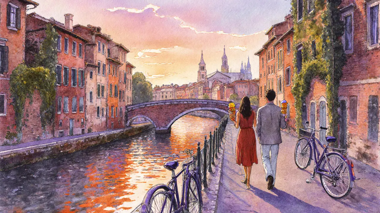 A man and woman walking along the Navigli canals with gelato at sunset.