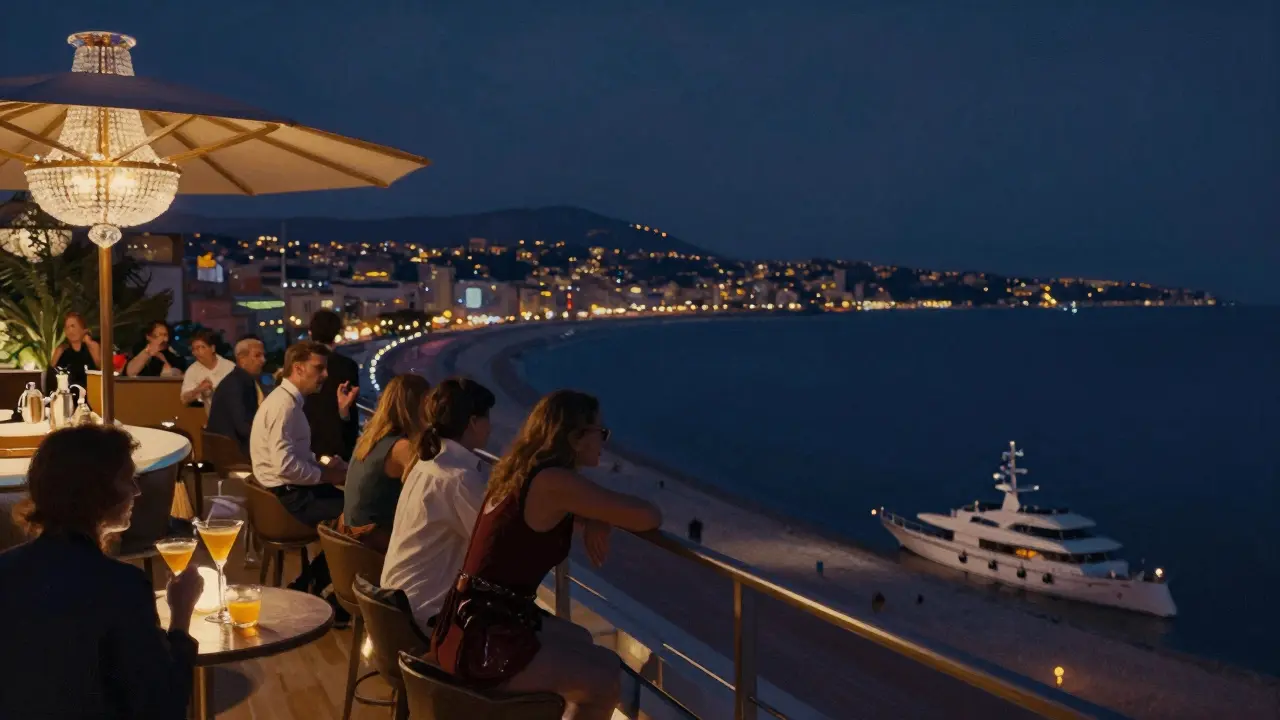 Rooftop bar overlooking the Mediterranean with guests sipping cocktails under chandeliers.